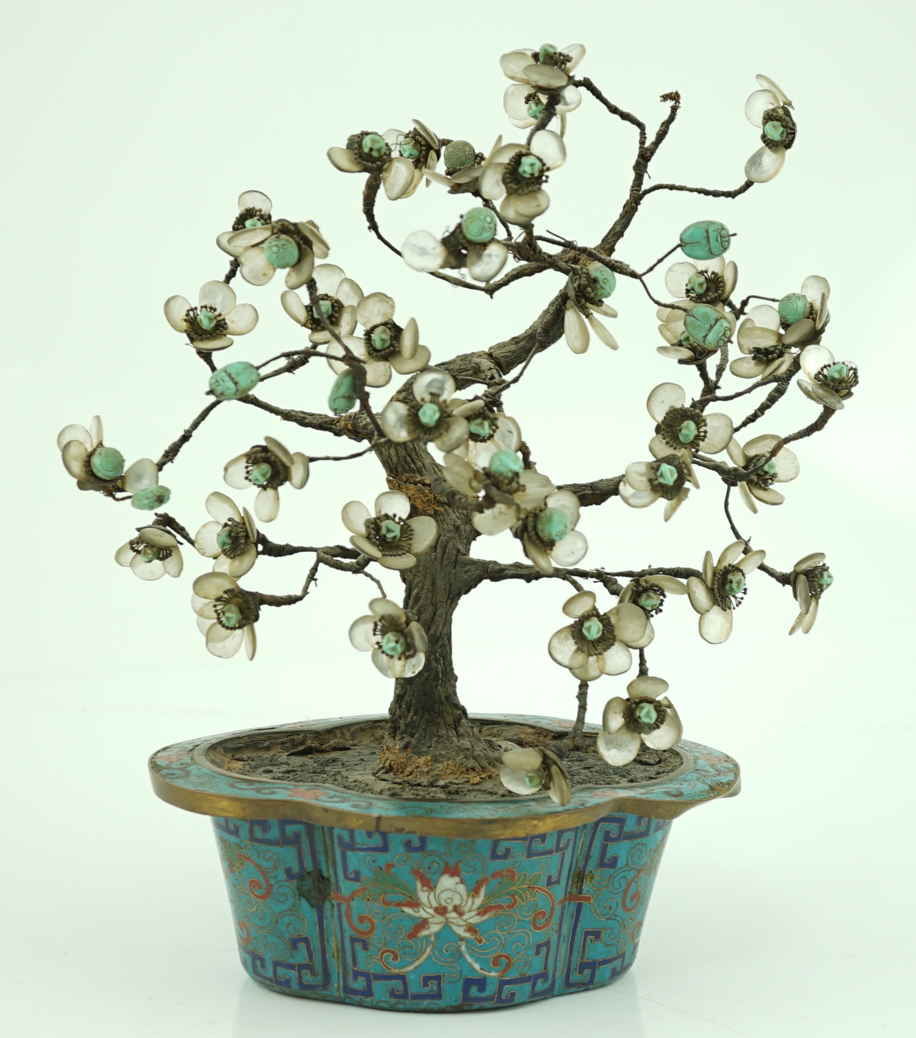 A Chinese cloisonné enamel jardiniere housing a glass mounted model tree, 19th century